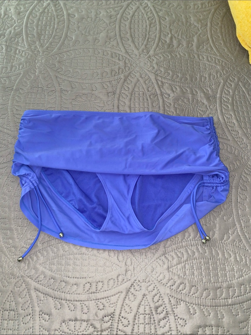 Women’s Purplish Swim skort with Adjustable sides.